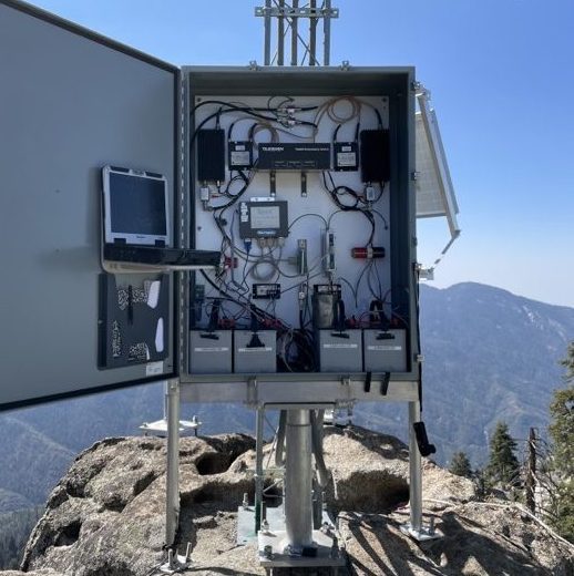Open datalogger and radio enclosure at a remote mountaintop station